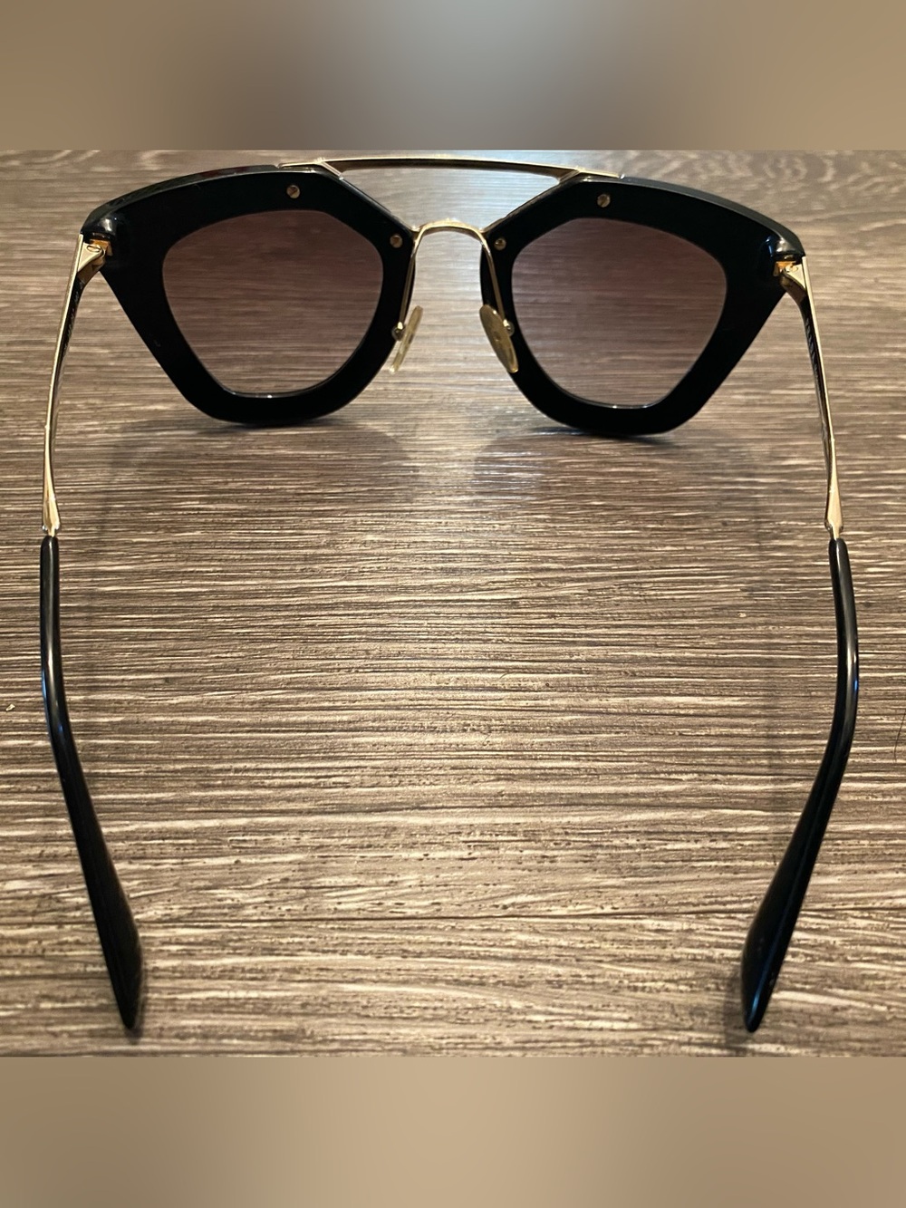 Prada Black Frame Cat-Eye Sunglasses with Gold Bridge - Picture 3 of 7